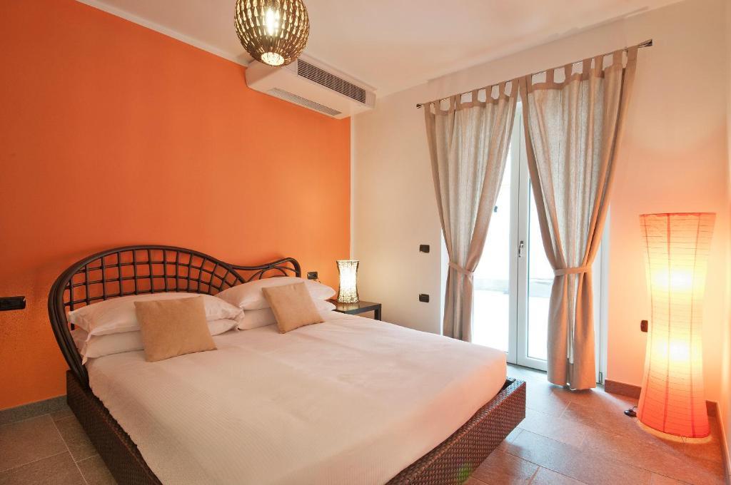 Helianthus Residence Канеро Ривиера Стая снимка